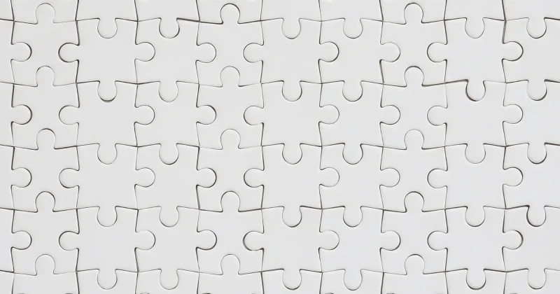 blank puzzle pieces fitting together